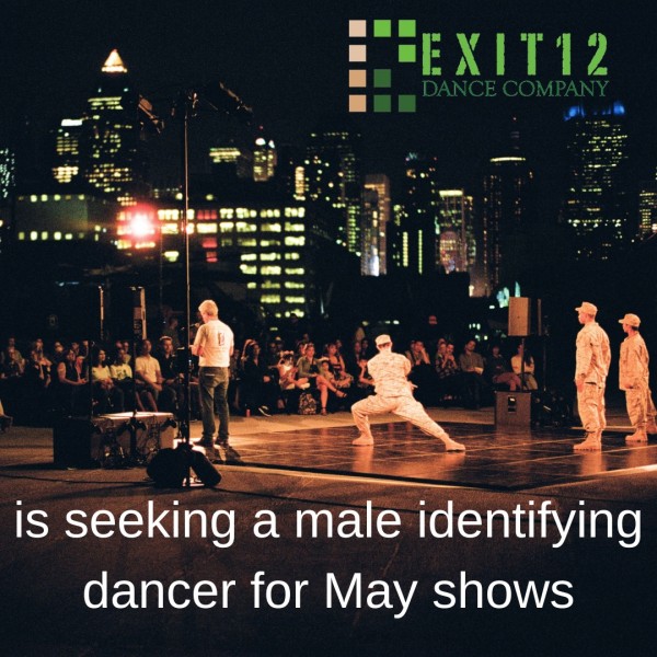 Dancers and a poet on stage on the Intrepid Air. Sea and space museum with New York City in the background