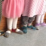 Daycare dance students practicing first position