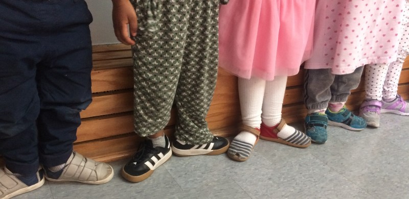 Daycare dance students practicing first position