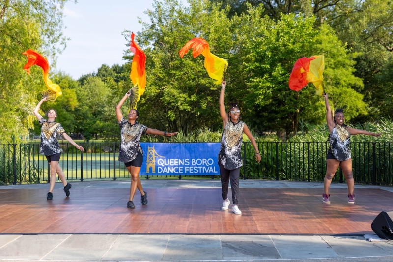 Photo from outdoor Queensboro Dance Festival event, celebrating dance and culture