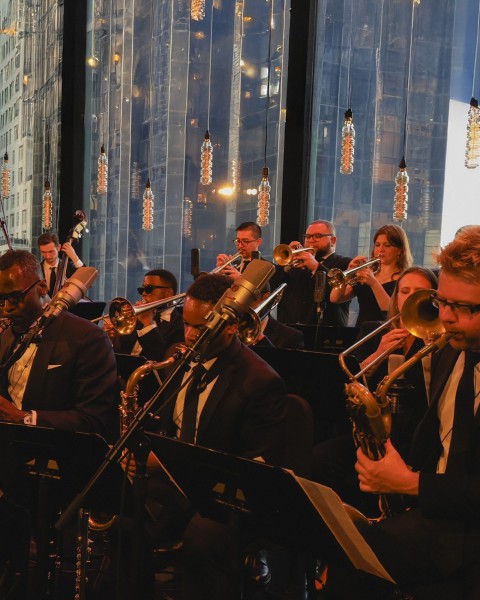 The Louis Armstrong Orchestra performing live.