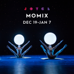 two dancers holding lightbulb orbs