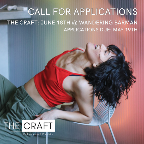 Image of a dancer arched over a chair. 