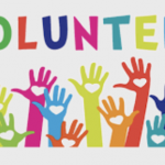 Multi-colored open hands raised with white hearts in the palms