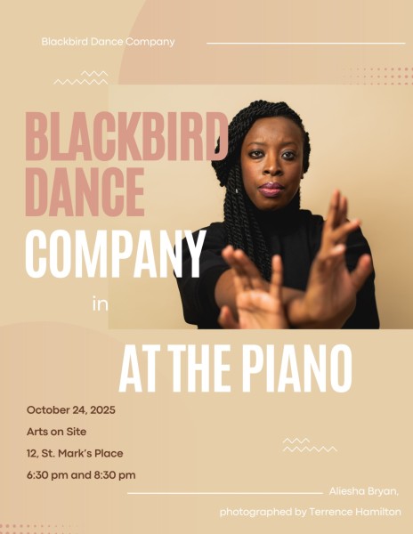 An African American woman with long braids wearing a black turtleneck with outstretched arms. 