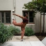 Dancer posed outside of Ping Yuen Community 