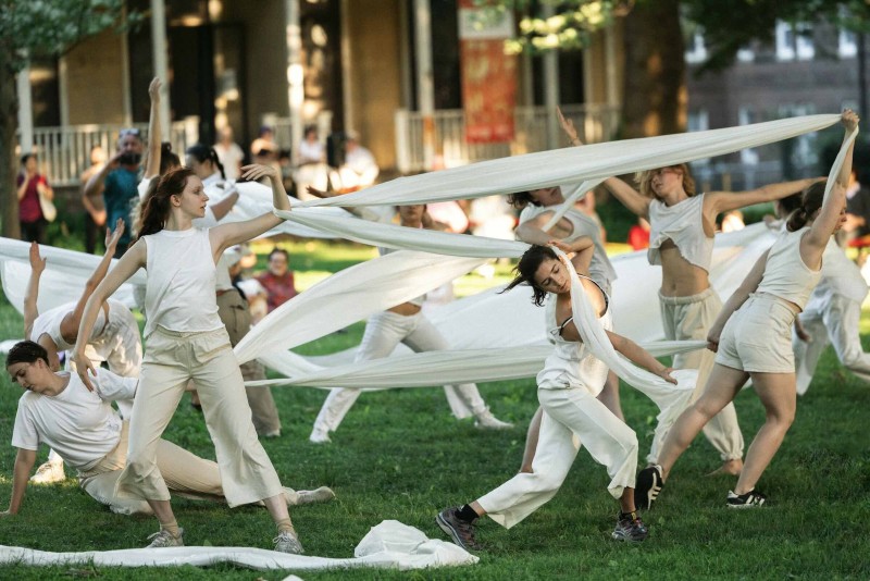 dancers moving with fabric