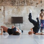 Three young dancers from Biennale College Danza 2023 are dancing