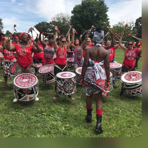 Batalá New York members performing at Curlfest; an outdoor festival