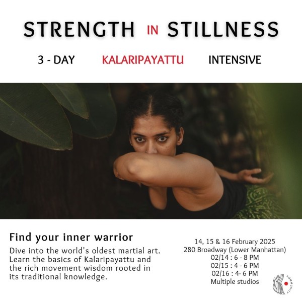 Swati is wearing a black tank top and posing in wild boar posture in Kalari 