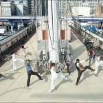 Dancers move in unison on the deck of the tall ship Wavertree at South Street Seaport Museum.