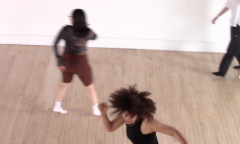 documentation of DIDIDADA. Three dancers in motion in a dance studio.