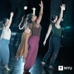 Four dancers in multicolored clothing reach their right arm up with NYU logo on the bottom right corner