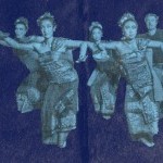 5 dancers in traditional Balinese dance costume. They are holding a right "agem" position as part of a welcoming dance.