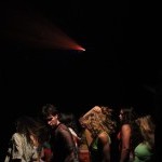 Dancers in club-like space