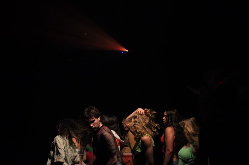 Dancers in club-like space