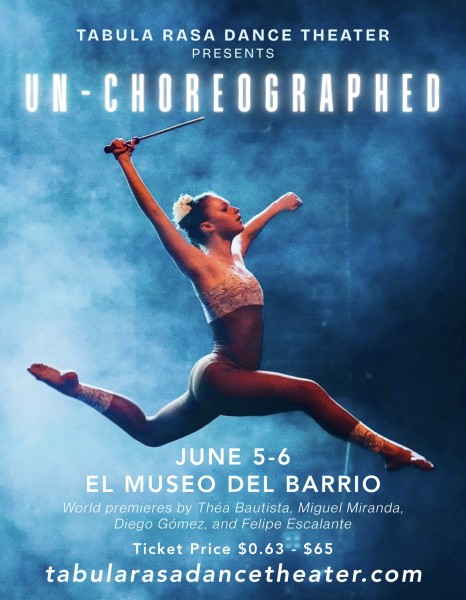 A dancer leaps in the air with both of her legs bent and her right arm over her head.