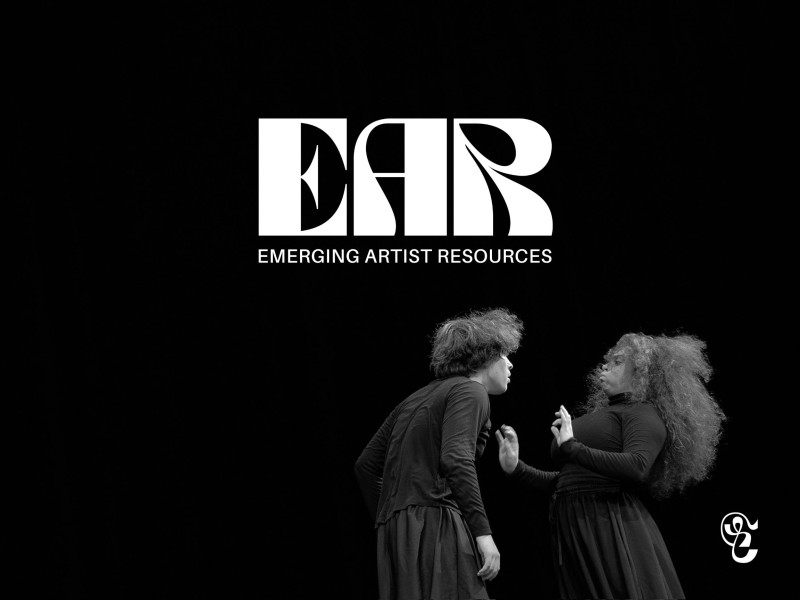Words EAR Emerging Artist Resources in the center of a dark image. Two people dancing in the lower right corner.