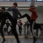 3 dancers in rehearsal