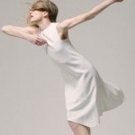 Wendy Whelan strikes a pose in a white dress.