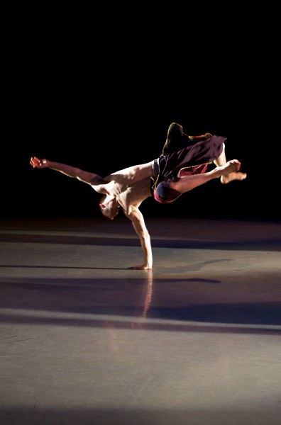 Athletic Male Dancer in a hand stand