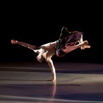 Strong and Athletic Male Dancer in a hand stand