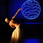 dancer silouhette with blue sphere