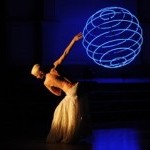 dancer silouhette with blue sphere