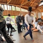 The 2023-24 Curriculum in Motion® Institute cohort dancing in Perles Family Studio.