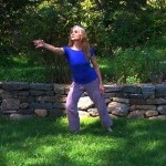 Dance by water reaching up, overlaid on harbor landscape during sunset