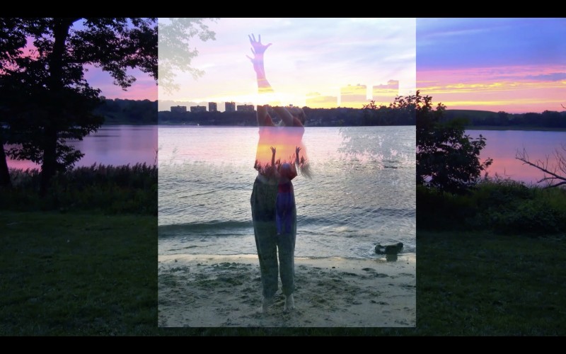 Dancer by water, reaching up, overlaid over sunset scene