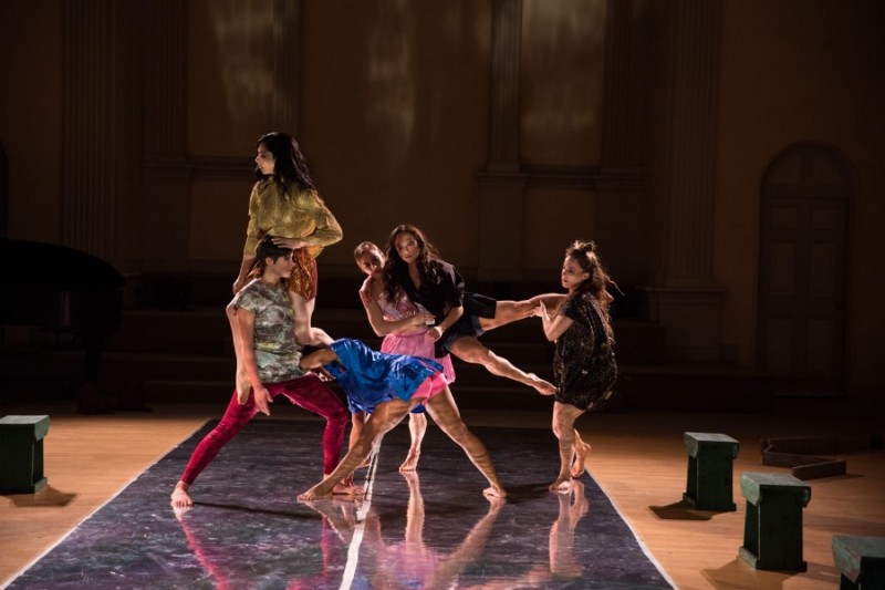 Dancers doing a lift on stage