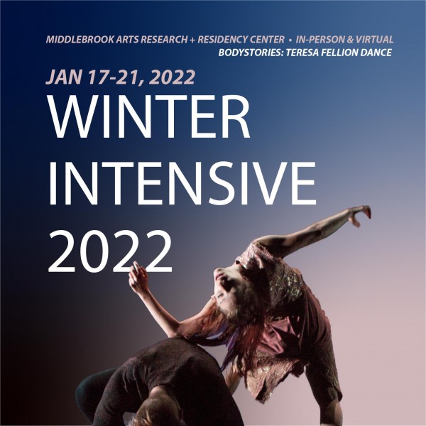 Dancer stands on all fours while another rests their arm along the other's back