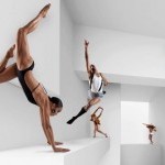 dancers in a photography studio on white cubes
