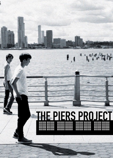 Two men walk side by side with the Hudson River in the background.