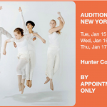 four dancers in white jumping