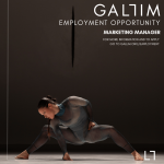 Promo image for GALLIM employment opp featuring a single dancer in a low, wide, grounded pose onstage against a dark background.