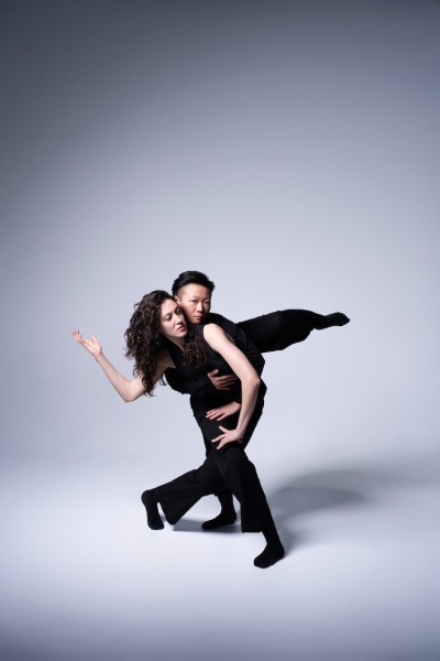 2 dancers in connected shape