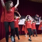 A HOTR Volunteer Teaching Artist Performing with our Little Superheroes