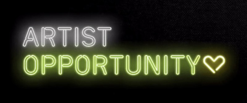 Image of a neon sign that reads "artist opportunity"