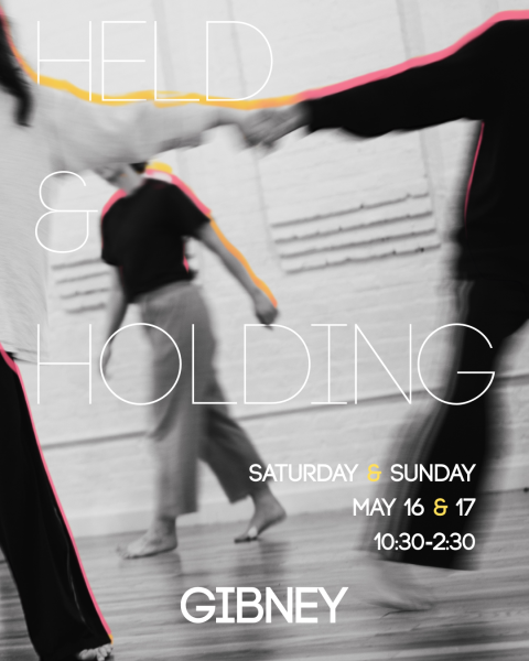 Image of two dancers holding hands with one dancer walking in the back. Text on screen "Held & Holding"