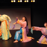 Three dancers in "moorish" costumes