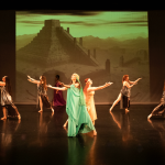 Representative of Ancient Mesopotamia. 5 visible dancers are visible reaching out in supplication.