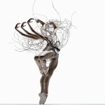 A dancer with 6 arms and 4 legs emits a sinewy sculpture through its torso