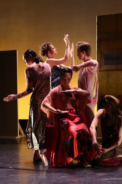 5 dancers perform sitting room tasks