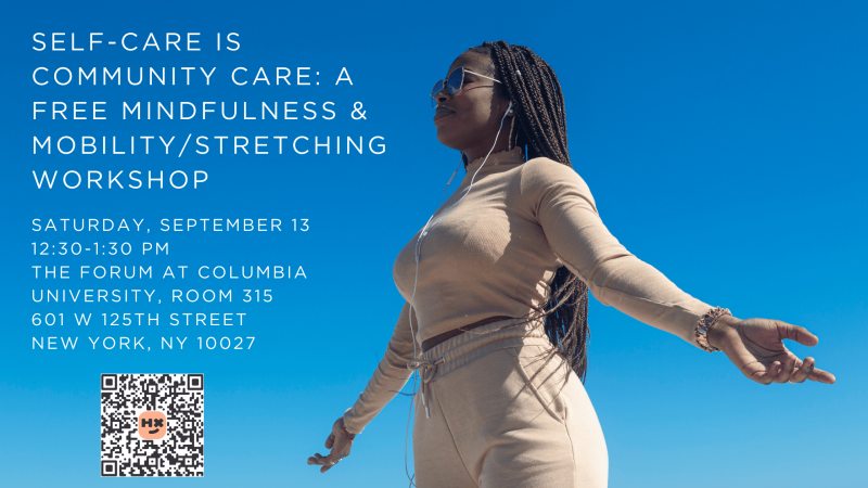 A Black woman with Ebony skin and Black braids in a beige top & pants is standing with her palms facing front.
