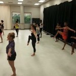 Artists in parallel attitude second during the Elementary Balance Series in a Horton Modern class