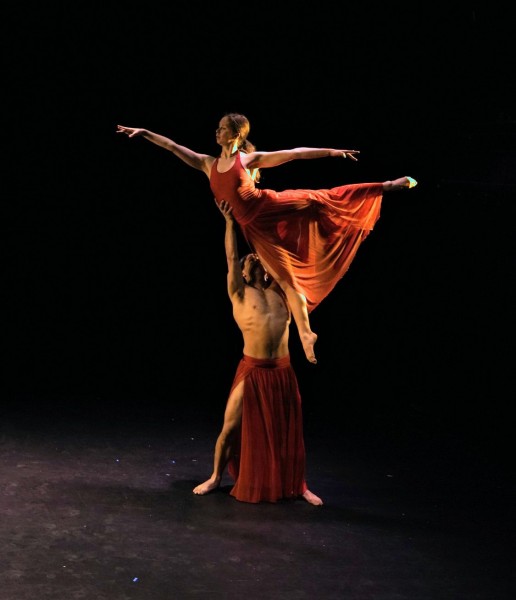 Male dancer doing a press lift 