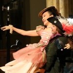 Male dancer lifts a female dancer.