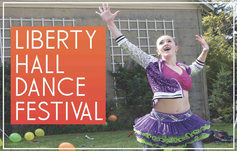 Dancer in sequins with arms over head looking excited